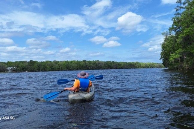 a small boat in a body of water